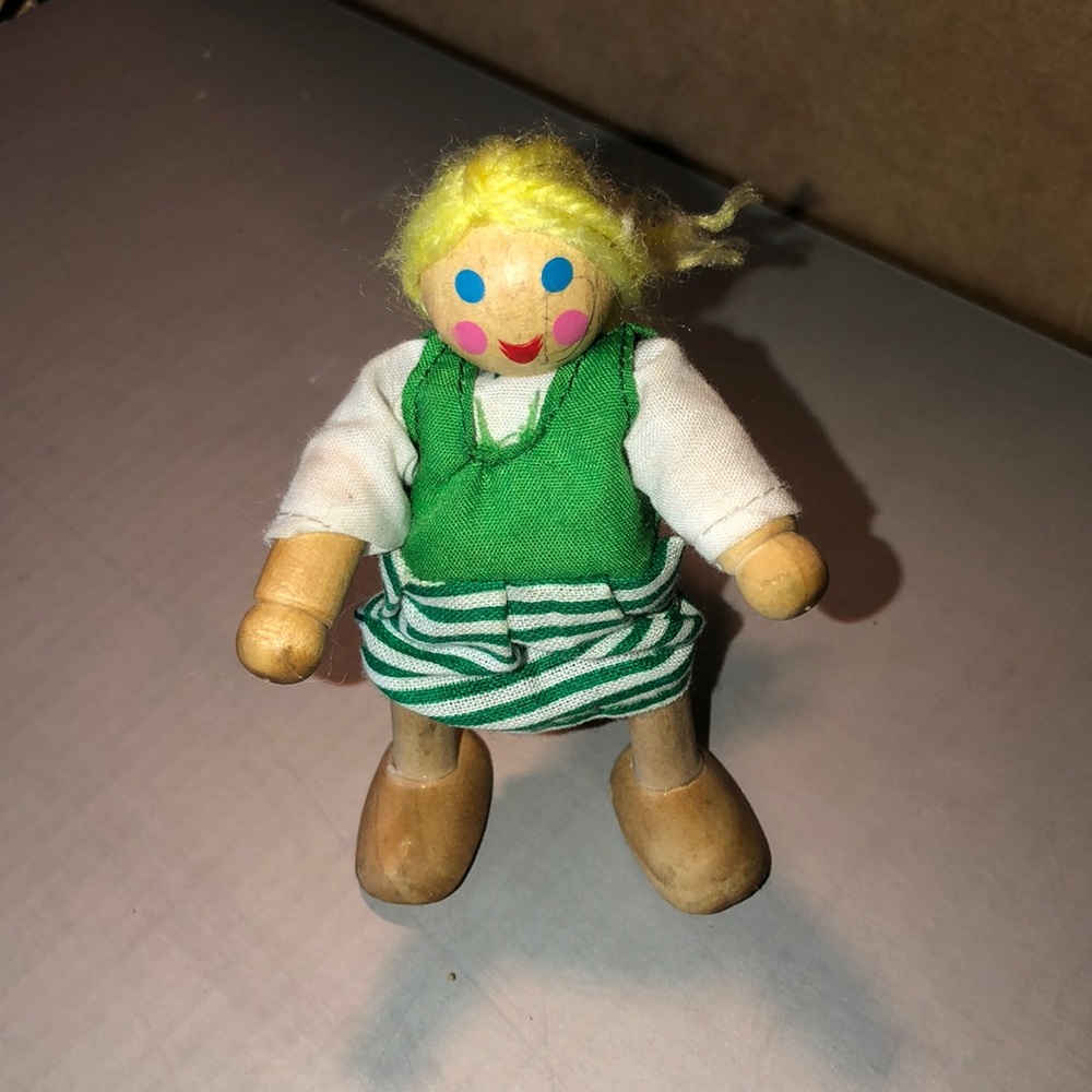 SOLD cross-listed elsewhere Melissa And Doug Little Wooden Dolly from a set.